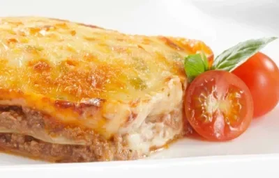 LASAGNA DE PAPA Y SALSA BOLOGNESA